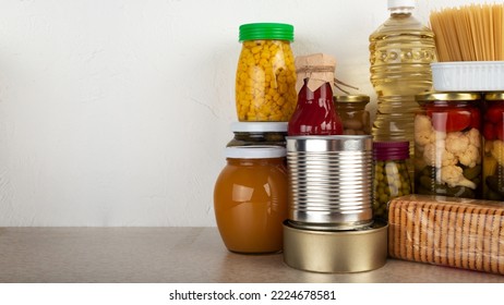 Emergency Survival Food Set On White Kitchen Table