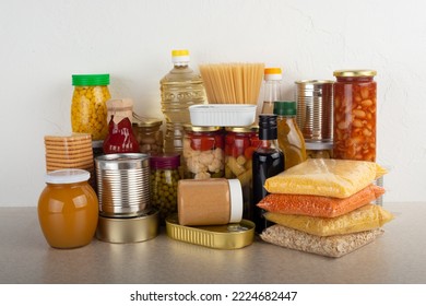 Emergency Survival Food Set On White Kitchen Table