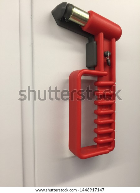 Emergency Tools to smash a window in a dangerous\
situation red emergency\
hammer