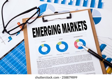 emerging markets analysis concept on clipboard - Shutterstock ID 258879899
