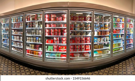 Emeryville, CA - Oct 31, 2019: Grocery Store Refrigerator Freezer Aisle With Ice Cream In Various Brands And Flavors. 