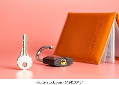 Emigration Rights Protection Concept. Key And Padlock With Passport As Symbol Of Security And Privacy Immigration Documents Or Leakage Of Bank Customer Data.