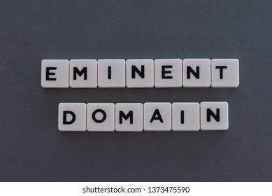 Eminent Domain Word Made Of Square Letter Word On Grey Background.