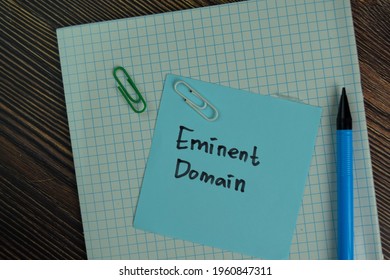 Eminent Domain Write On Sticky Notes Isolated On Wooden Table.