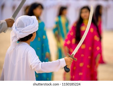 Emirati Boy Dancing Traditional UAE Dance