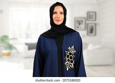 Emirati Middle East woman at home wearing Abaya Hijab traditional UAE women's clothing