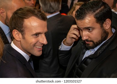 Emmanuel Macron (L) with Alexandre Benalla (R) during the visit of  the Salon du Livre international book fair at the Porte de Versailles exhibition center in Paris, France, on Friday, March 15, 2018.