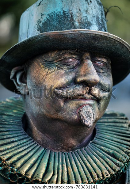 Emmen, Drenthe, Nederland, October 29, 2017, Living\
Statues, portrait of living statue Willem van Oranje with beard,\
moustache, hat and ruff