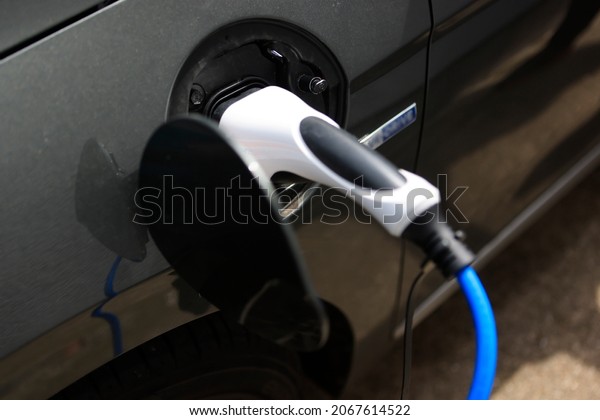 E-Mobility, Charging an\
electric car.