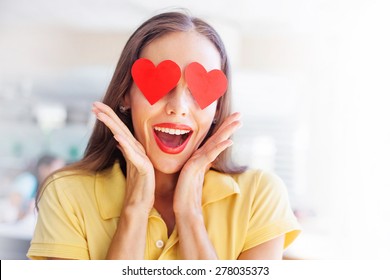 emoji concept: woman with the hearts instead of her eyes - Shutterstock ID 278035373