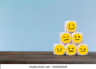 Emoticon Icons Face On Wooden Cube , Costumer Service Concept