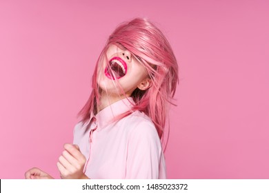 Emotion pink wig woman wide open mouth red lips makeup