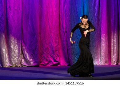 Emotional Actress In Black Dress Dancing And Playing A Role On The Stage Of The Theater. Flamenco Dance