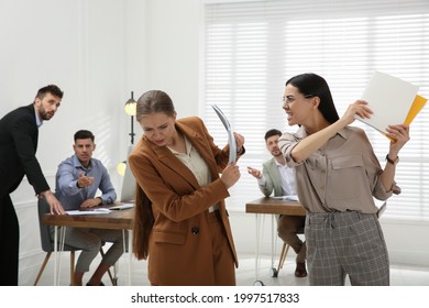 Emotional Colleagues Fighting In Office. Workplace Conflict