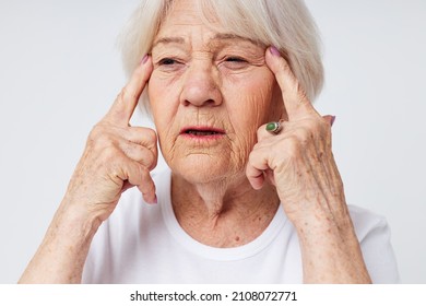 emotional elderly woman health lifestyle ophthalmologist sees treatment light background