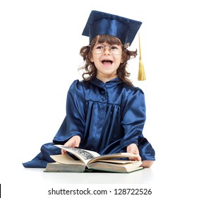 Emotional funny child in academician clothes  with book