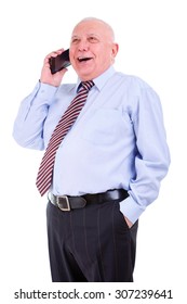 Emotional And Happy Old Senior Businessman In Shirt And Tie With White Teeth. Talking On Cell Phone With An Opened Mouth. Isolated, Plain White Background. Human Emotions And Facial Expressions