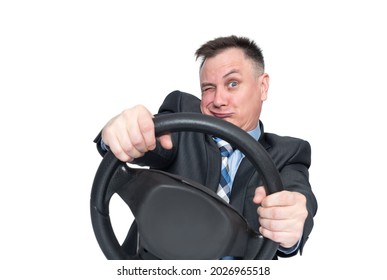 Emotional man in a dark jacket is reckless on the road while making a turn while holding a car steering wheel. Isolated on white background.