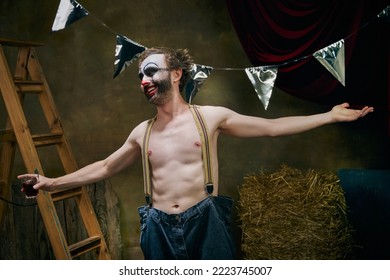 Emotional Man, Sad Male Clown Is Sad, Going Through A Personal Tragedy, Despair In The Old Retro Circus Backstage. Concept Of Fate, Job, Emotions, Facial Expression, Mental Health.