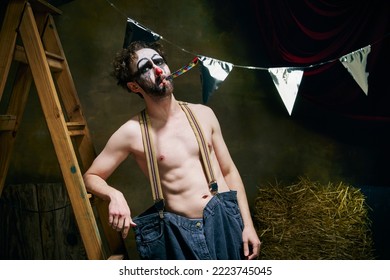 Emotional Man, Sad Male Clown Is Sad, Going Through A Personal Tragedy, Despair In The Old Retro Circus Backstage. Concept Of Fate, Job, Emotions, Facial Expression, Mental Health.