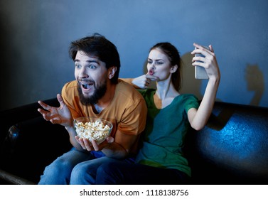emotional man and woman with phone                           