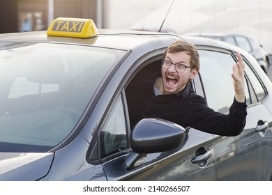 Emotional Portrait Of Angry Male Taxi Driver.