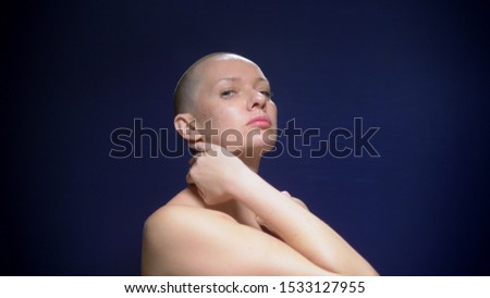 Similar – Image, Stock Photo Portrait of a young, very short-haired woman wearing an off-the-shoulder top through which you can see her nipples