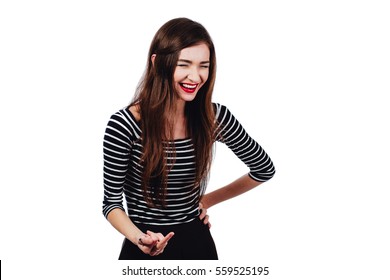 Emotional portrait Cute beautiful girl artist. . White background, isolated. Red lips, long hair brunette. Art femininity concept. actor's portfolio photoshoot.middle finger laughing