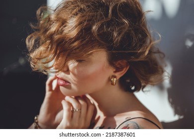 Emotional Portrait Of Fashion Stylish Portrait Of Pretty Young Hipster Blonde Woman,going Crazy,elegant Black Hat,soft Colors,cool Crazy  Girl.Red Urban Wall Background.surprised Girl Close Up, Sunset