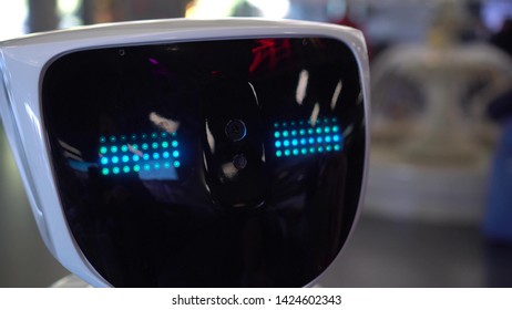 Emotional Robot. The Human Robot's face expresses emotions - happiness, joy, smile. Modern Robotic Technologies