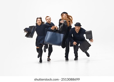 Emotional shopping activity during mega sales season, Group of people all in black outfit running with shopping bags forward. Concept of shopping, sales, Black Friday, fashion, holiday - Powered by Shutterstock