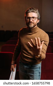 Emotional Stage Director With Scenario Gesturing On Rehearse In Theater