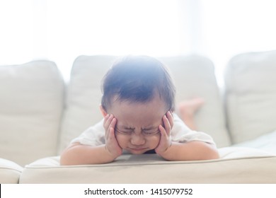 Emotional Tantrum And Angry Toddler Boy At Home.Mad Kid Got Upset And Sad And He Has A Negative Attitude.Depressed Baby Boy Complaining.Attention Deficit Hyperactivity Disorder (ADHD) Concept.