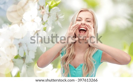 emotions, expressions and people concept - young woman or teenage girl shouting over natural spring background