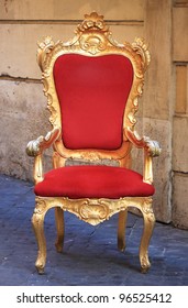 Emperor throne made with gold and red velvet