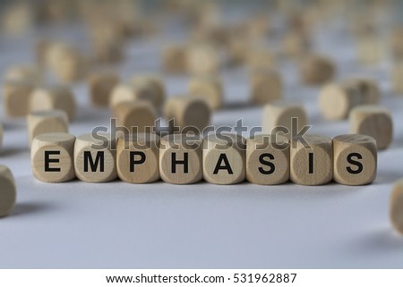 emphasis - cube with letters, sign with wooden cubes
