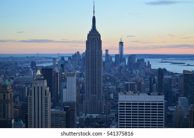 Empire State Building At Sunset With Freedom Tower Under Construction In The Background - 2013