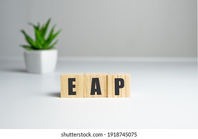 Employee Assistance Program EAP Sign On Wooden Cubes