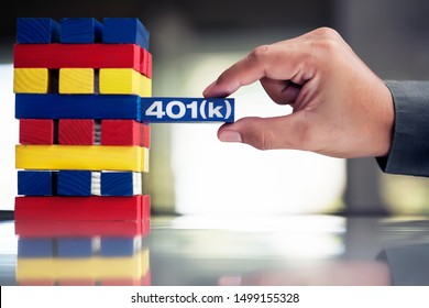 An Employee Carefully Handling His 401k Retirement Plan To Invest In A Stocks, Bonds, Mutual Funds, Or Other Assets.