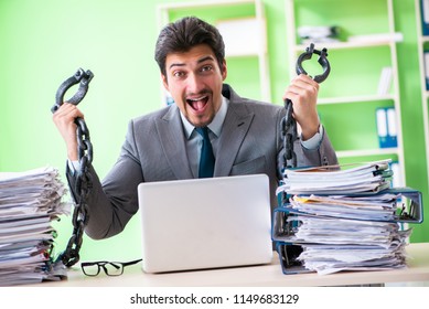 Employee chained to his desk due to workload