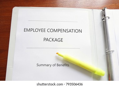 Employee Compensation And Benefits Package On A Desk With Highlighter                               