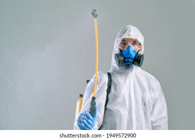 employee of decontamination services decontaminating the room. - Shutterstock ID 1949572900