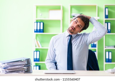 Employee Doing Exercises During Break At Work