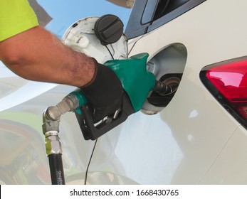 Employee Filling The Vehicle With Ethanol Fuel. Fuel Price Increase. Fuel Crisis
