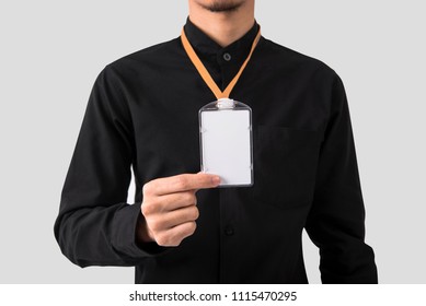 employee hand showing blank id card badge holder for mockup template logo branding background.