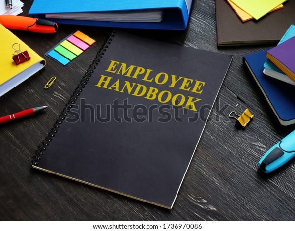 Employee\
handbook and papers with rules and\
procedures.