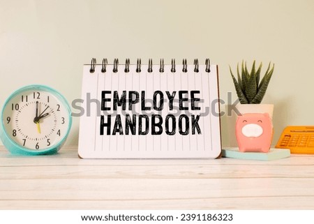 Employee handbook text concept write on notebook.