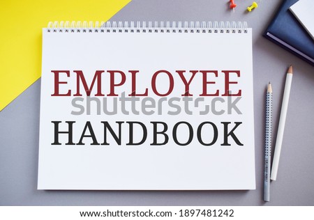 Employee Handbook text written in Notepad.Business photo text Document Manual Regulations Rules Guidebook Policy Code