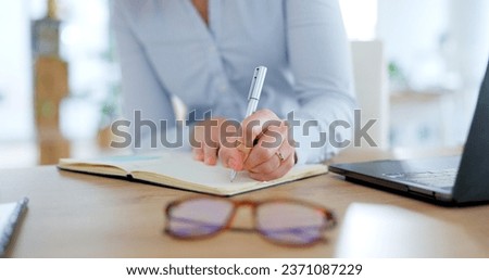 Employee, hands and writing notes in journal with desk, laptop and business schedule, agenda or administration reminder. Office notebook and woman planning in diary with ideas, review or research