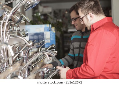 A Employee Of A Hardware Store At Work.